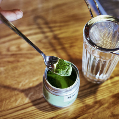 Matcha being scooped