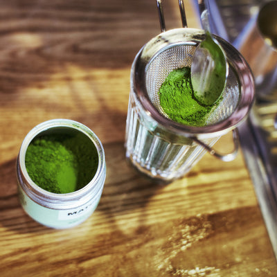 Matcha being sieved