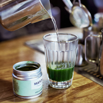 Matcha being brewed